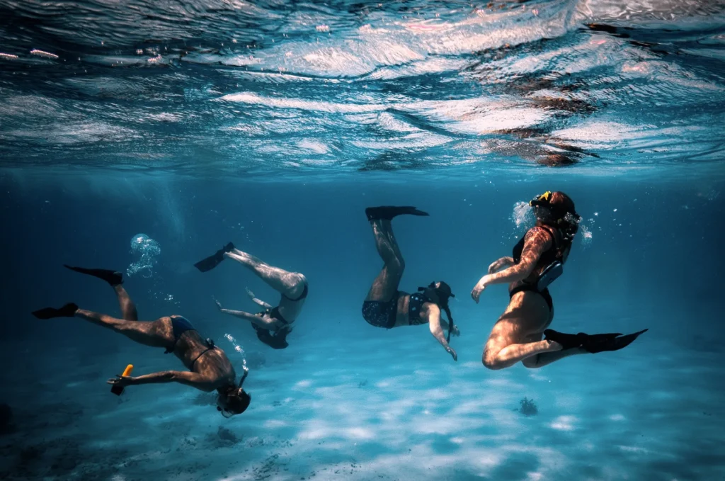 Underwater view of a private snorkeling group in Bonaire